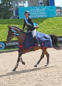 Faye Adams and Demograaf win the National Winter 1.35m Championship